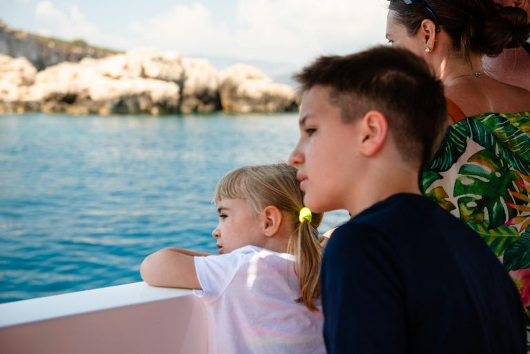 Kids enjoying sea trip on cruise ship.